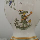 Table lamp with wooden base and fringed shade