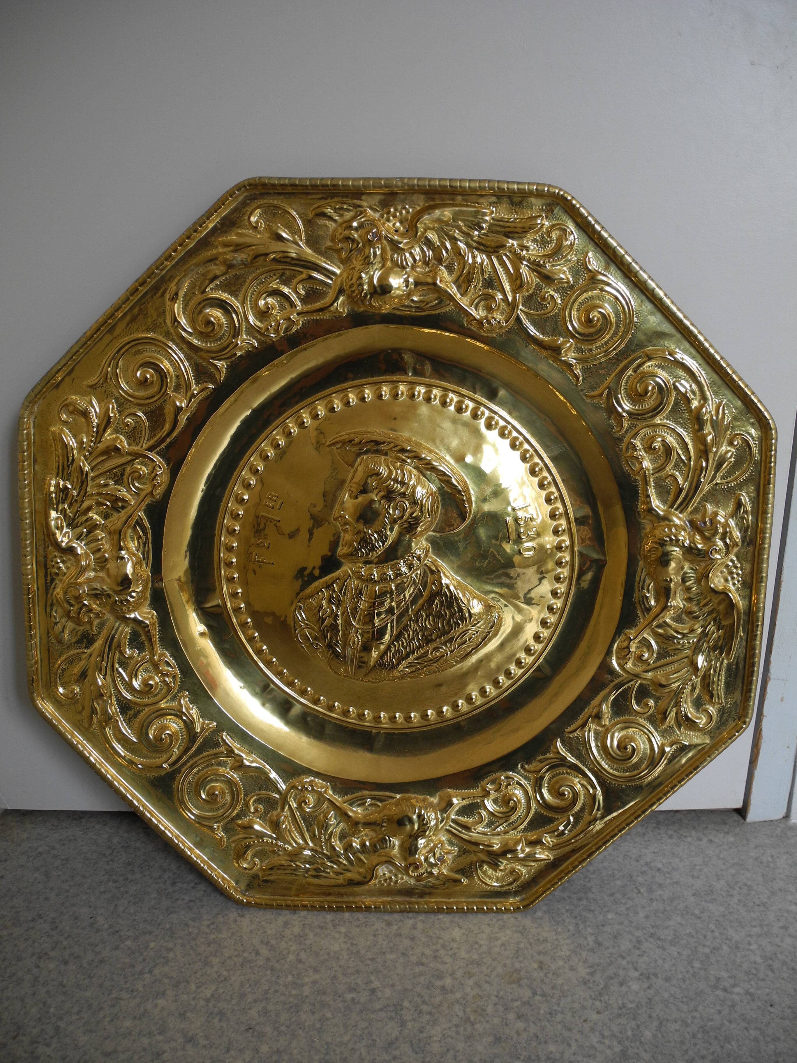 Offering dish in embossed brass by François I