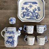 Antique Chinese tea set decorated with dragons.