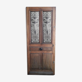 Old entrance door, glazed oak cast iron grilles 1925