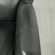 Black cowhide wingback armchair in classic English style