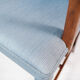 Armchair in mahogany and upholstered with light blue fabric by Fritz Hansen