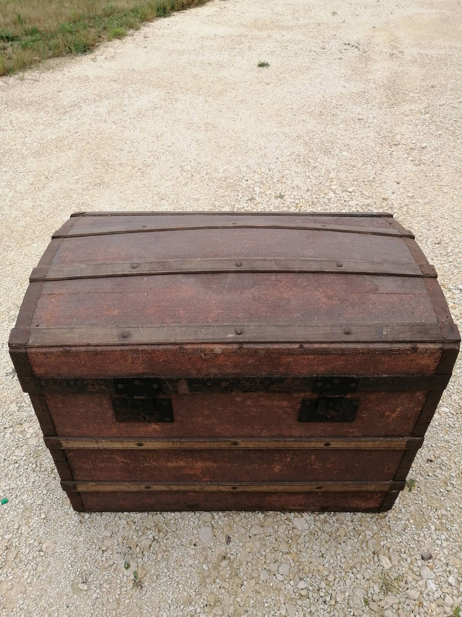 Old bombed travel trunk
