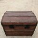 Malle de voyage ancienne bombee