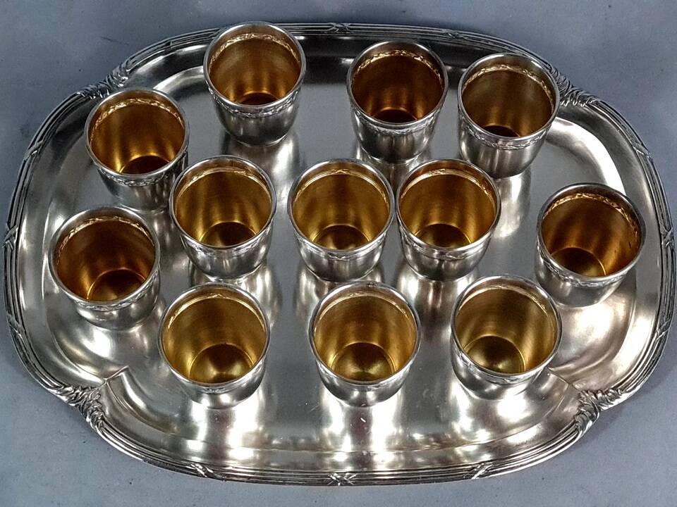 Antique silver-plated/gold liquor service with 12 goblets, tray + case.