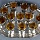 Antique silver-plated/gold liquor service with 12 goblets, tray + case.