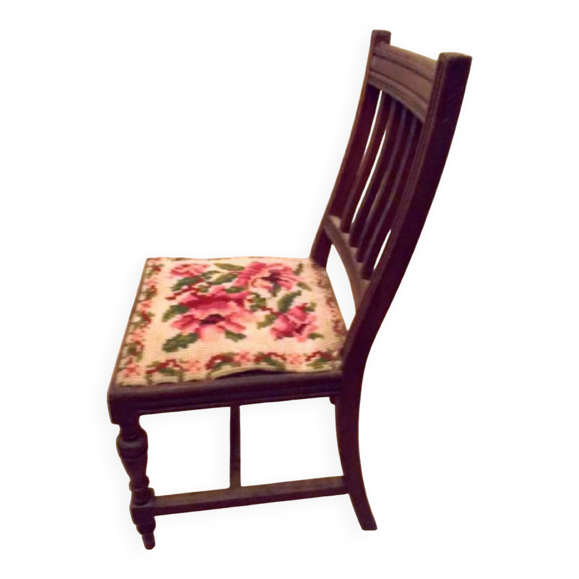 Wooden chair with embroidered seat