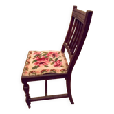 Wooden chair with embroidered seat