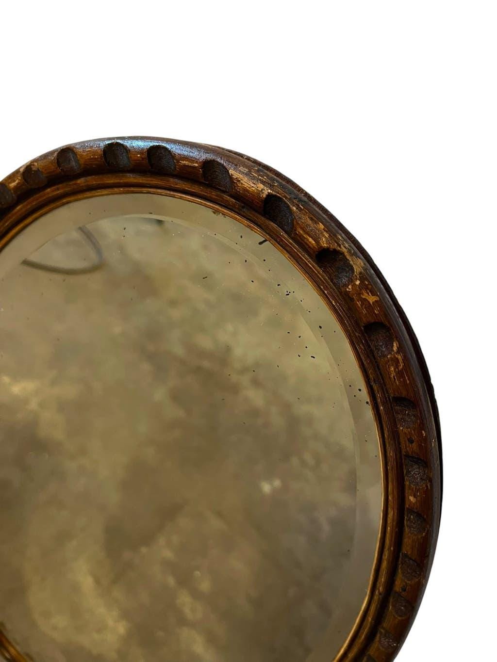 Robust vintage oval wall mirror in wood