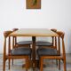 Set of 4 chairs 60s in teak and black leatherette