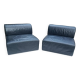 Pair of vintage black leather easy chairs