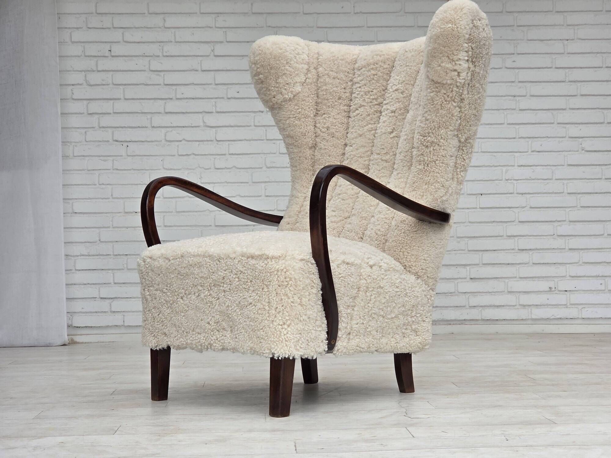 1960s, Danish high-back armchair, genuine sheepskin, reupholstered.