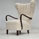 1960s, Danish high-back armchair, genuine sheepskin, reupholstered.