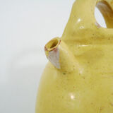 Ancienne cruche, chevrette, pichet à eau en grès jaune vernissé. Début XXème siècle