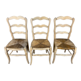 Three chairs in natural wood seat mulched