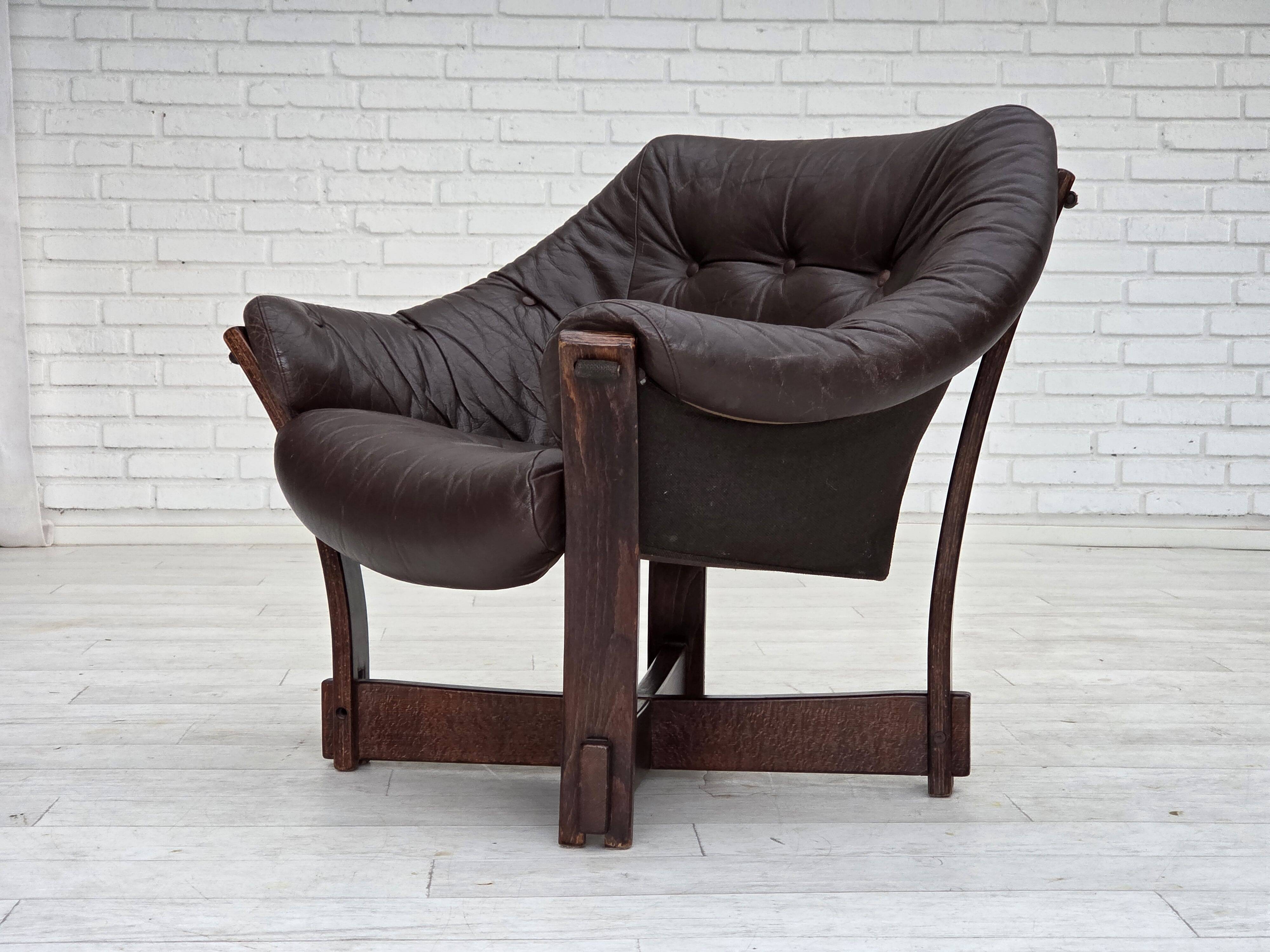 1970s, Scandinavian lounge chair, furniture leather, oak wood.