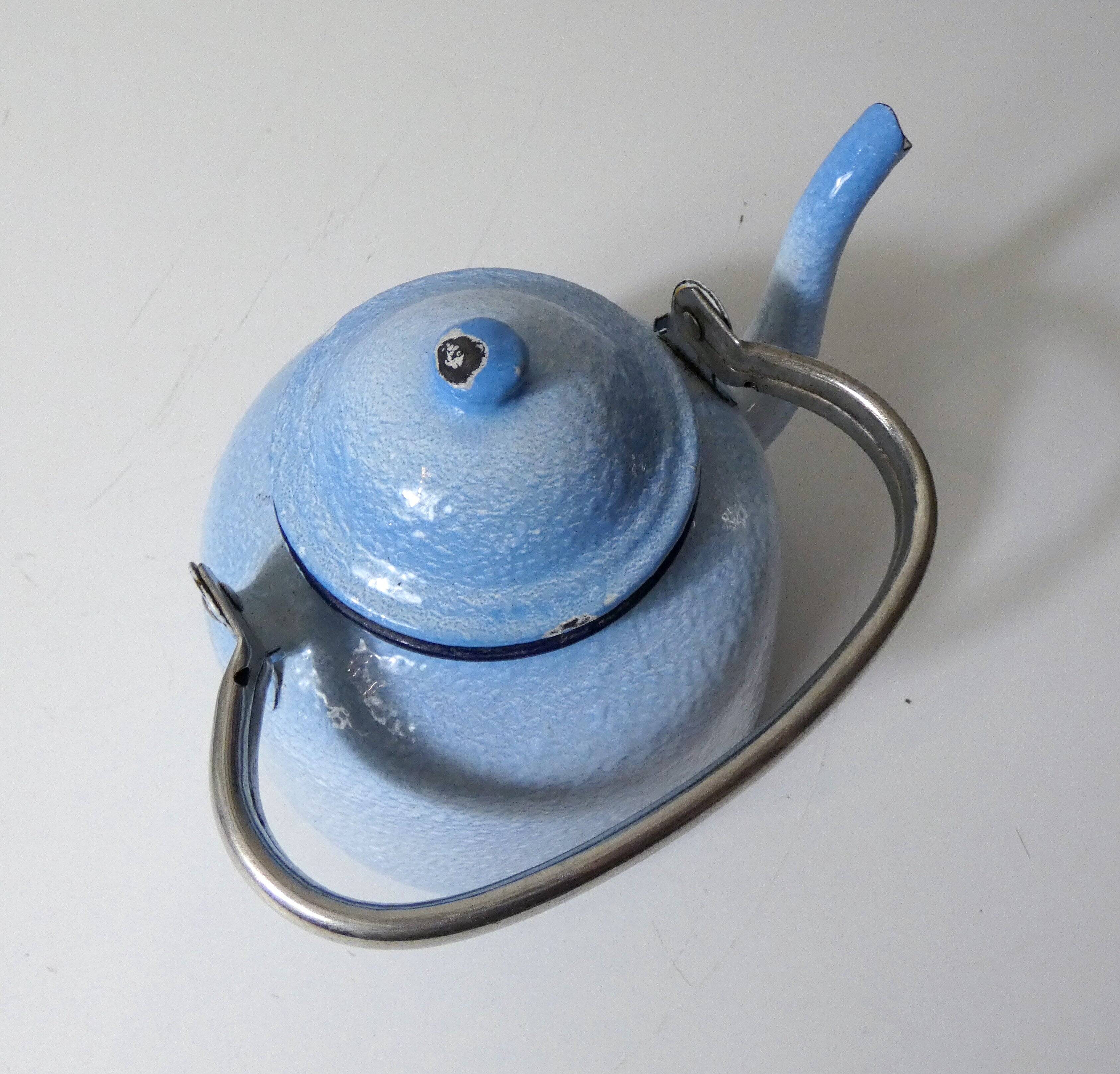 old enamelled steel kettle