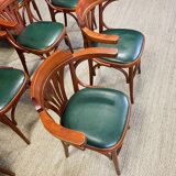Set of 10 wooden bistro armchairs with green leatherette palmette from the 80s France