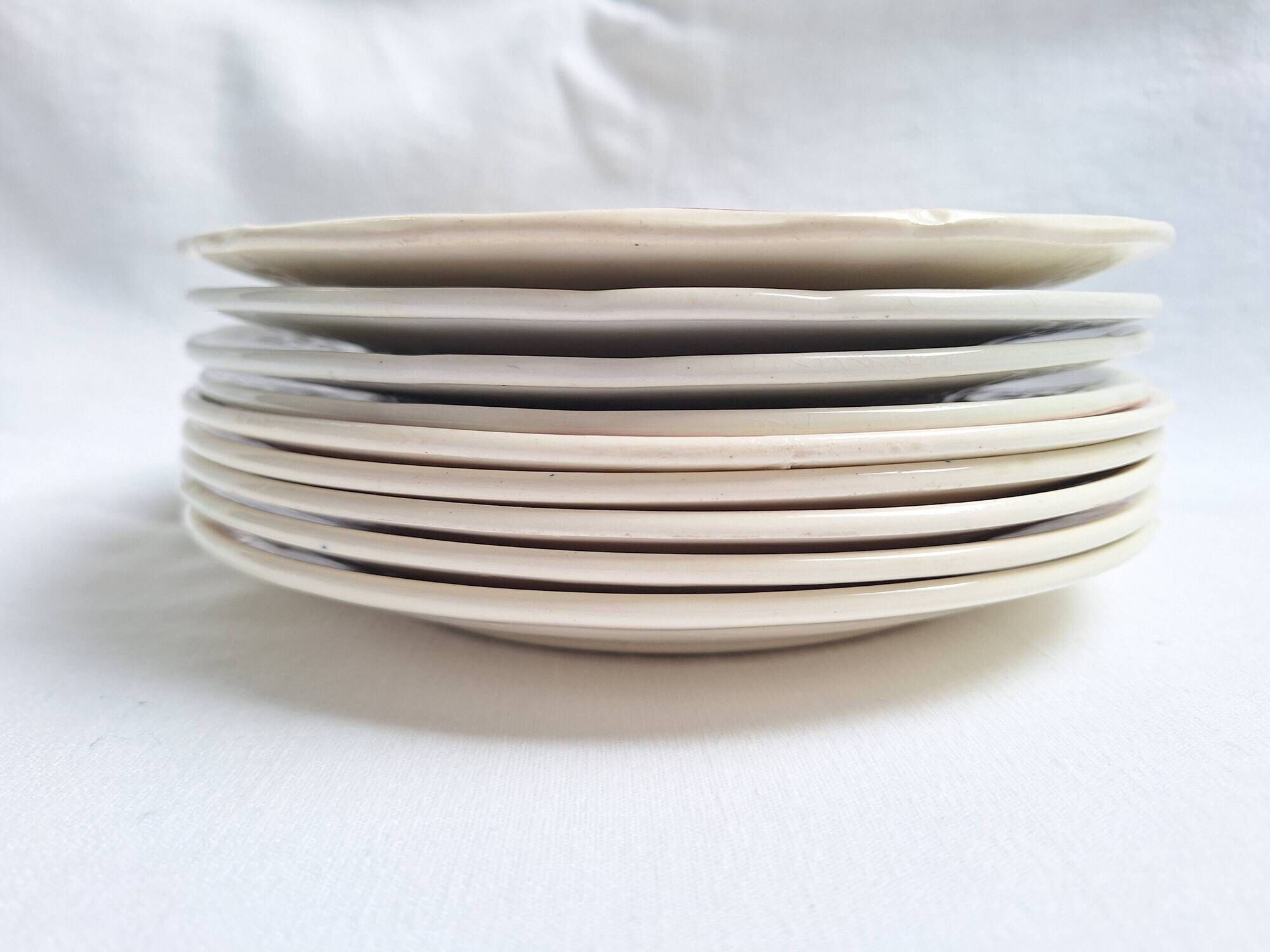 Vintage flower dessert plates from Sarreguemines, Longwy, and Lunéville.