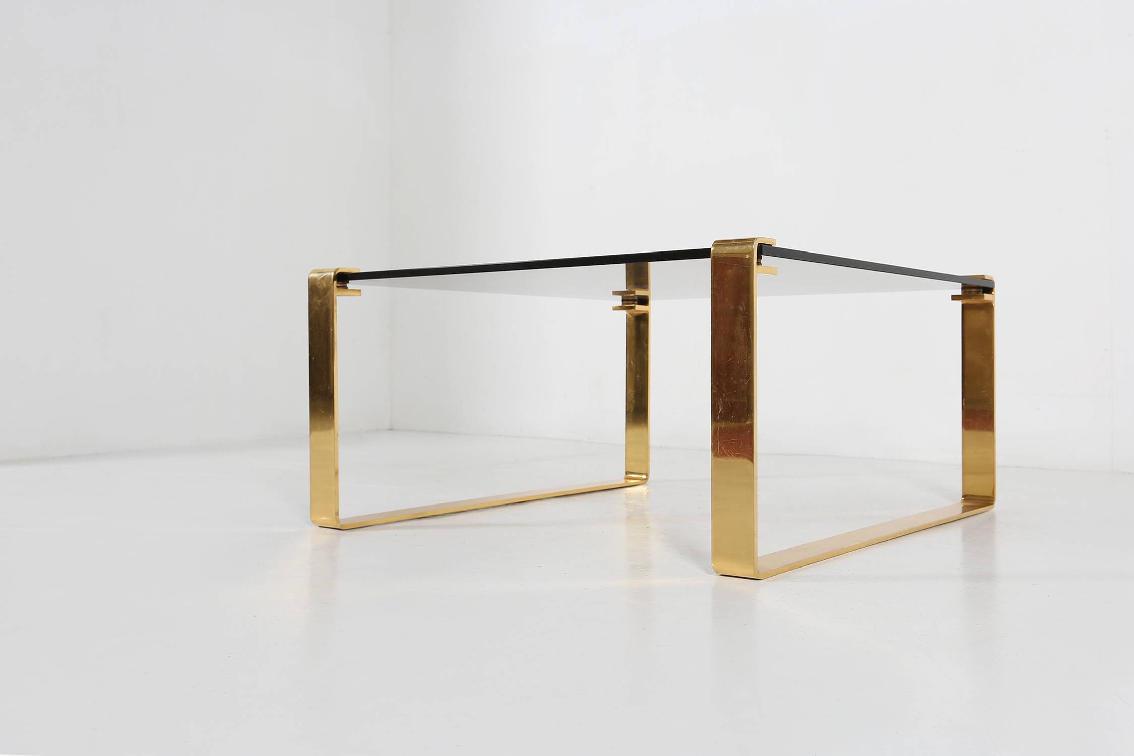 Mid-century coffee table with gold plated base and glass top, 1970s