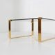 Mid-century coffee table with gold plated base and glass top, 1970s