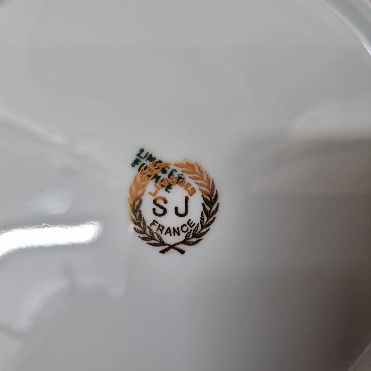 7 assiettes Limoges doré à l'or fin