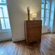 Small honey-coloured wooden buffet