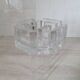 Candle holder or glass warmer with irregular ice effect.