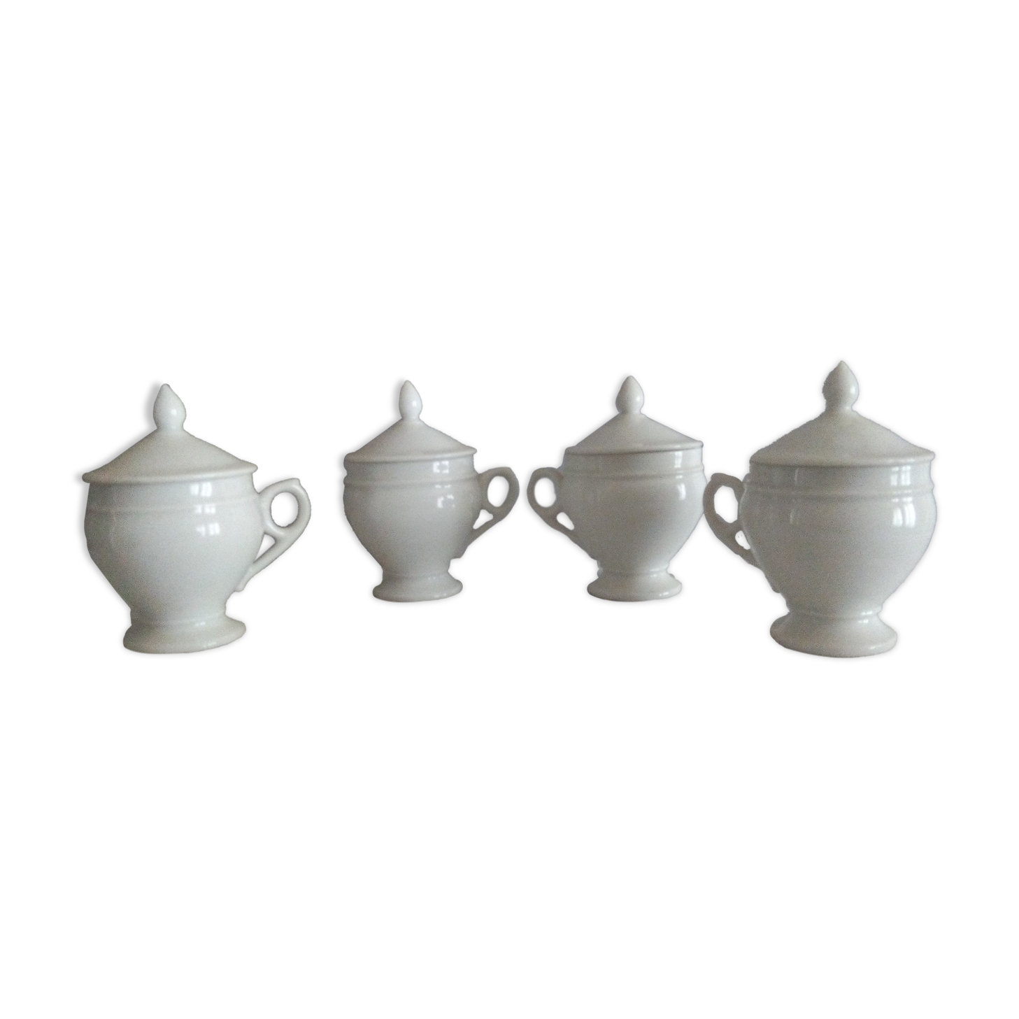 4 Porcelain cream jars