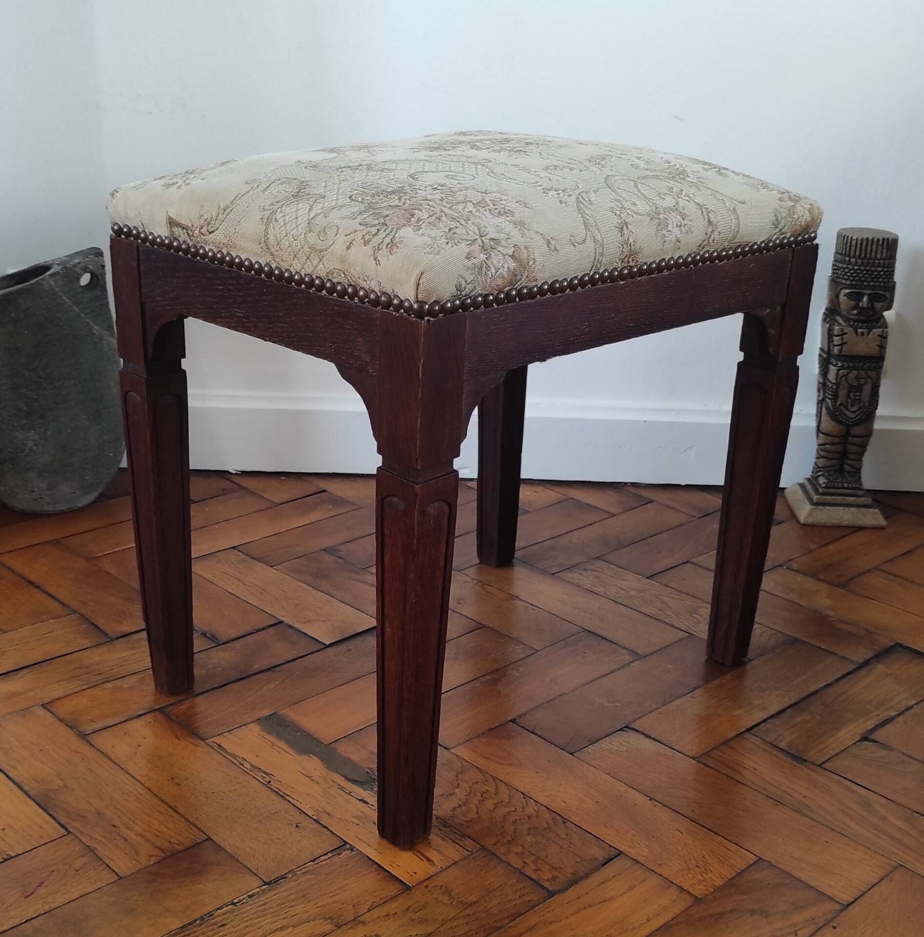 Footrest, vintage stool in solid oak with floral upholstery.