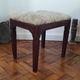Footrest, vintage stool in solid oak with floral upholstery.