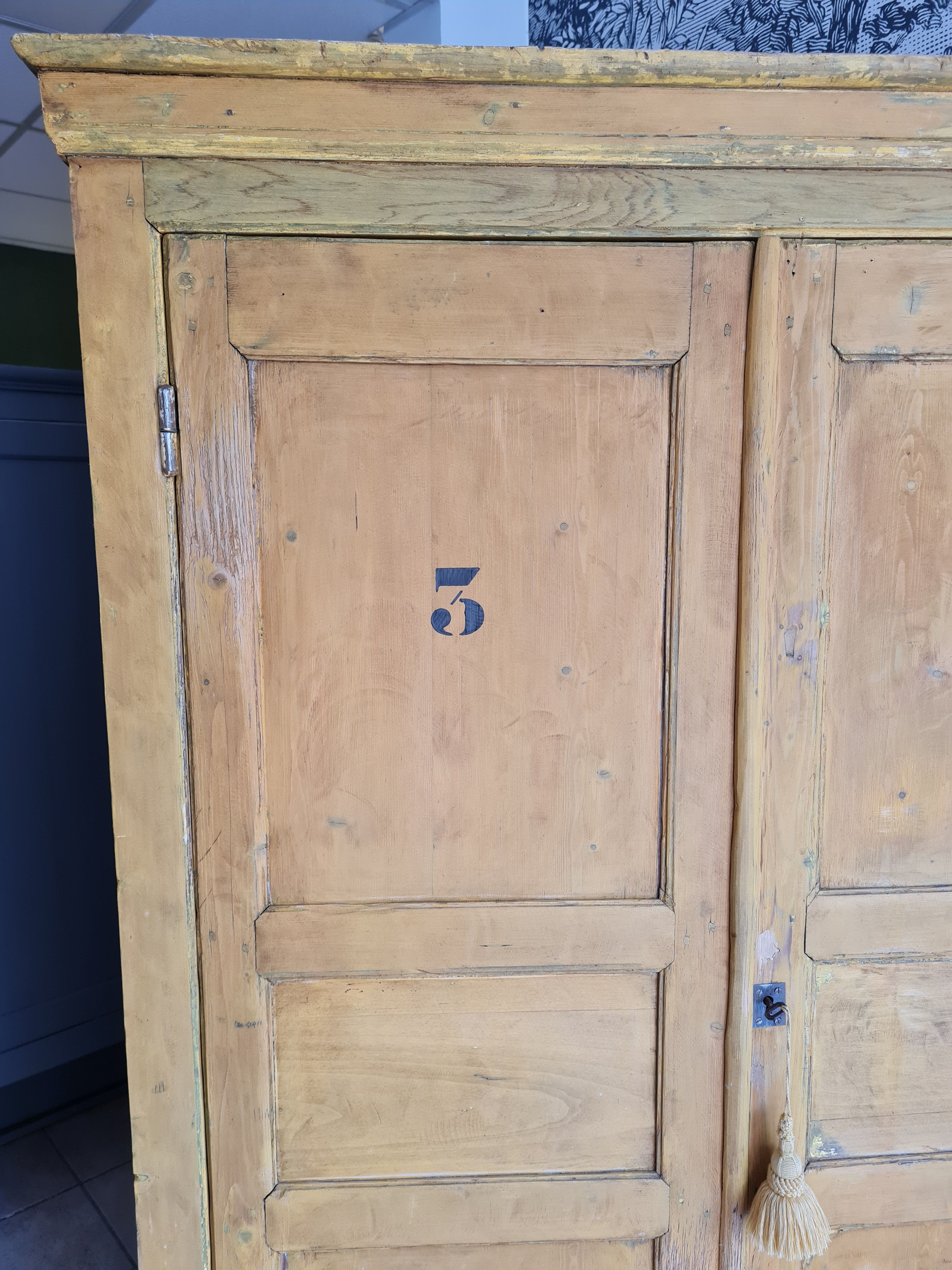 Mustard yellow patinated cabinet