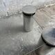Pair of modernist coffee tables with cylindrical steel legs