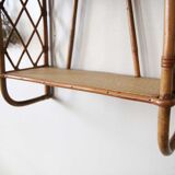 Rattan wall shelf