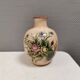 Italian vase from the 70s, in a delicate pink color with floral decoration.