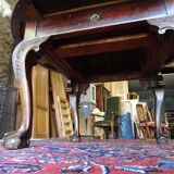 Nineteenth round table in carved mahogany with extension Ø 133 cm