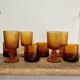 8 mismatched vintage amber glasses