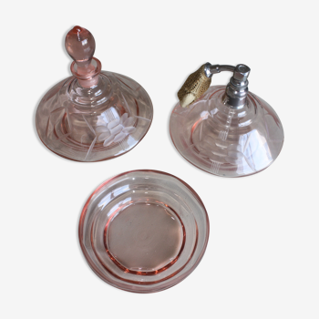 Perfume bottle with engraved base