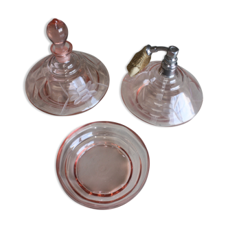 Perfume bottle with engraved base