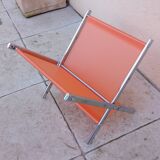 Vintage chrome and orange magazine rack from the 70s and 80s