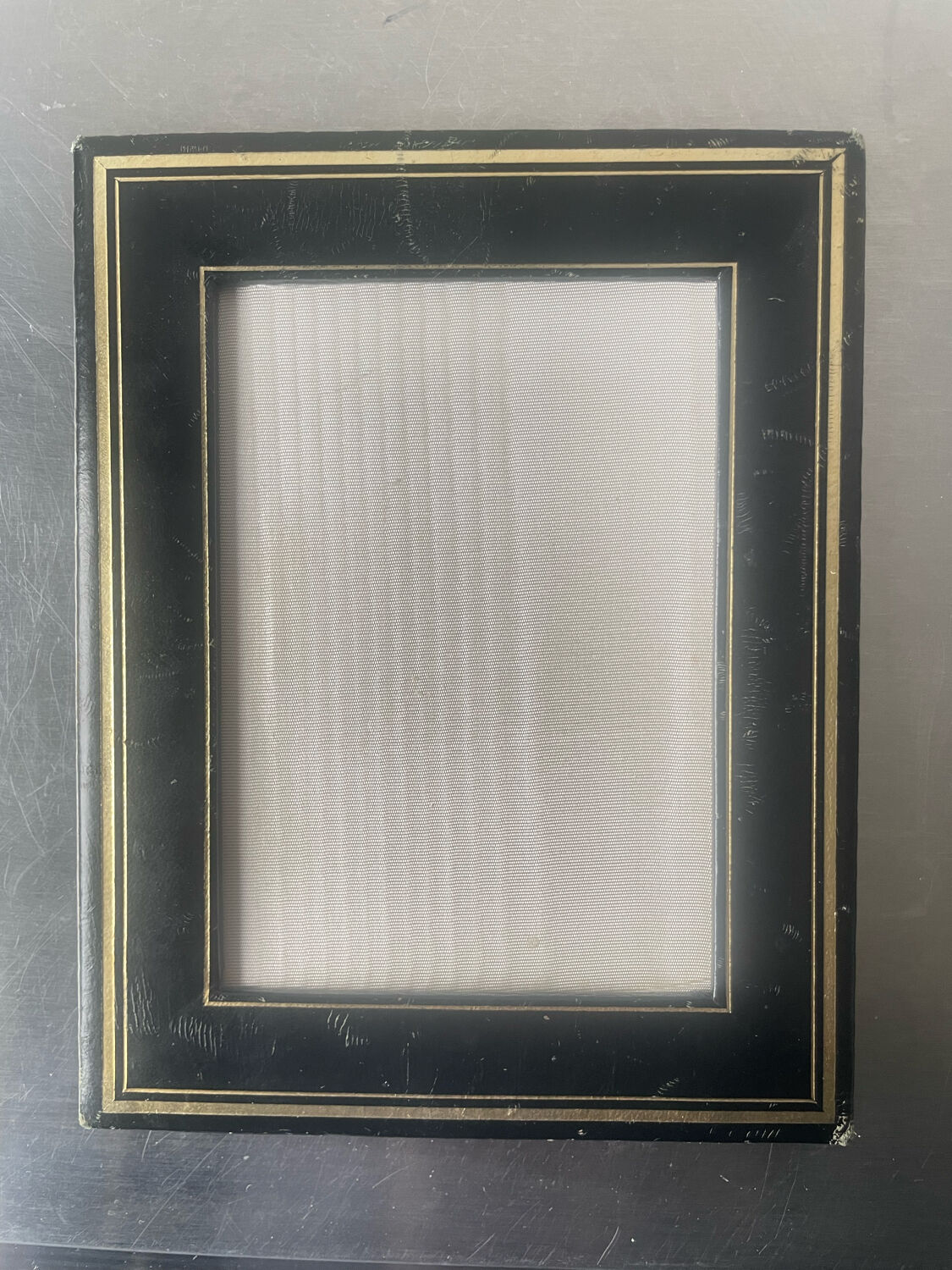 Antique black leather  with gilding frame measurements 19 cm x 15 cm