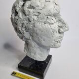 Clay sculpted head on marble base, 32 cm