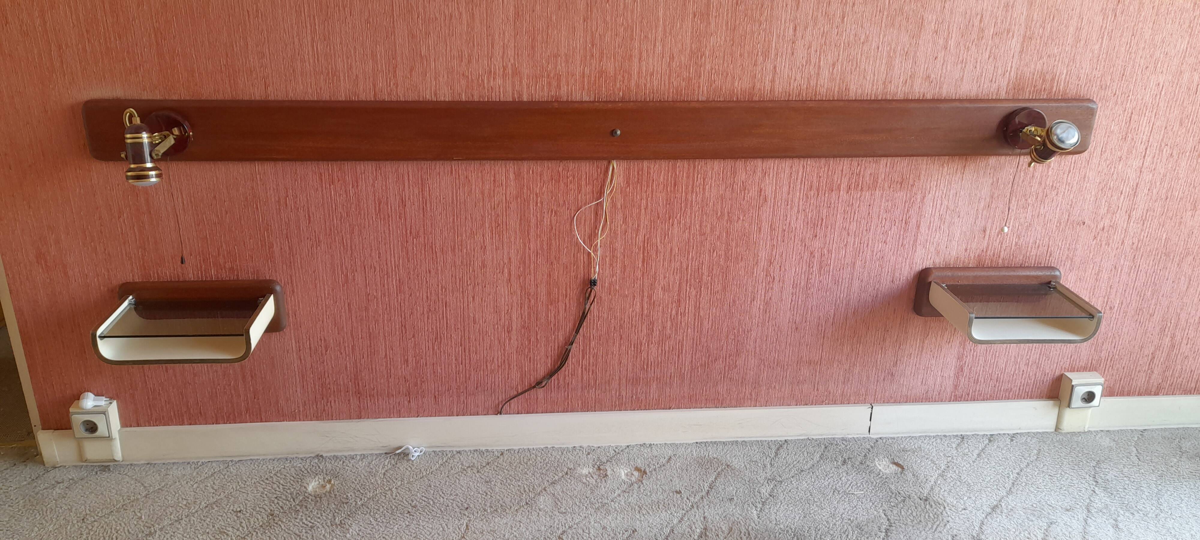 Pair of wooden bedside tables with smoked glass tops from the 1970s.