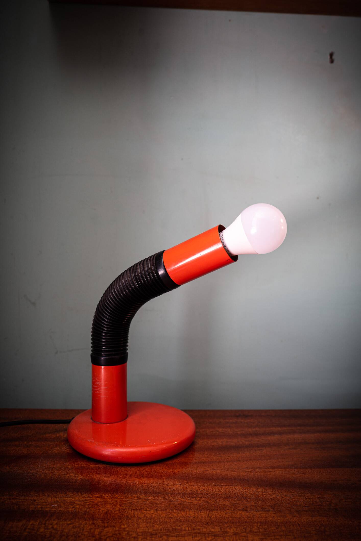 Orange Elbow table lamp by E. Bellini for Targetti Sankey, Italy, 70's