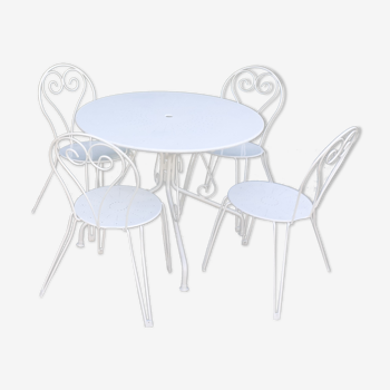 Salon de jardin 1 table 4 chaises en fer forgé blanc.