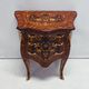 Marquetry chest of drawers with inlay in Louis XV style