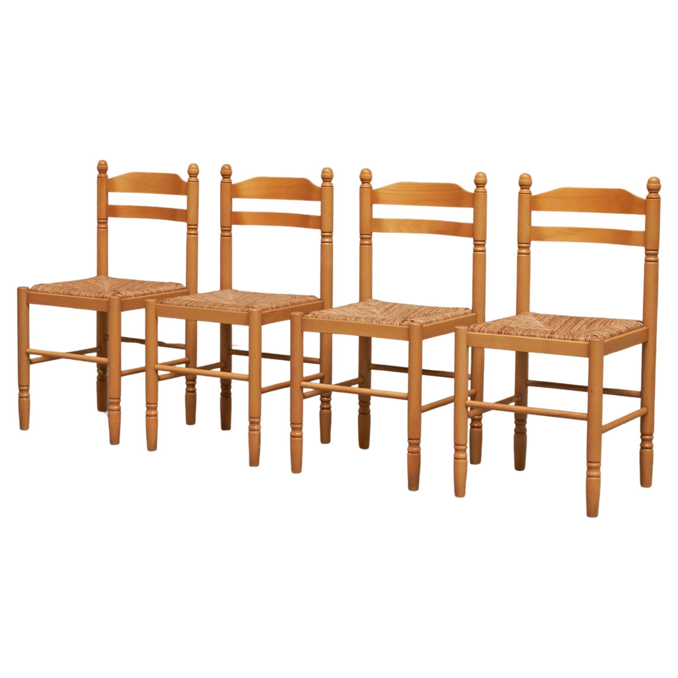 Set of 4 Mid Century beech dining chairs from the 1970s.