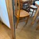 Grand miroir ancien en bois patiné doré