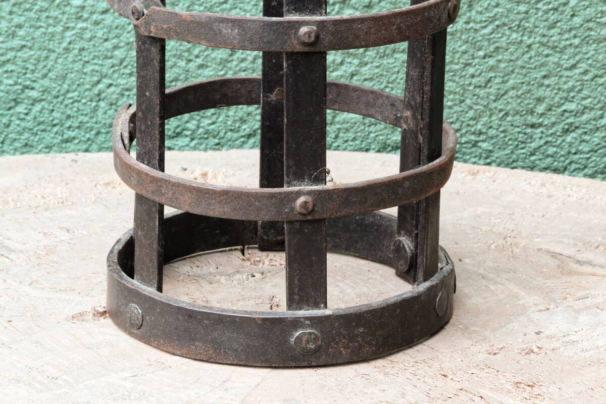 Riveted wrought iron cage suspension