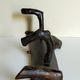 Art-Popular brutalist wall coat holder in solid wood